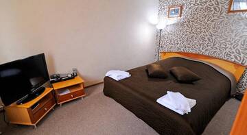 Стандартный семейный номер в Гостинице Orange Hotel